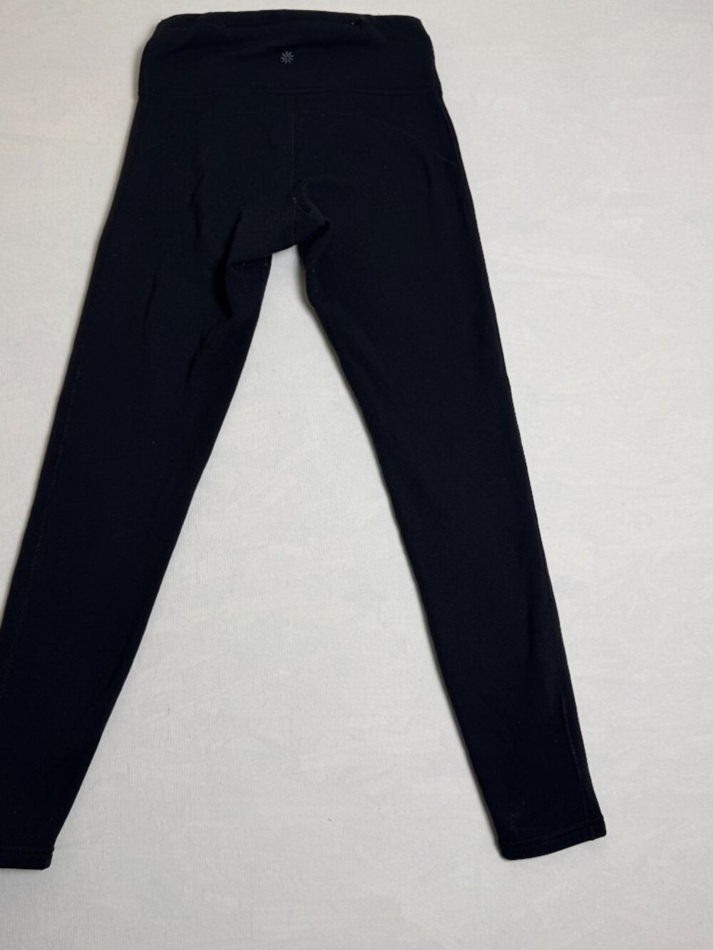 Athleta Ladies Color Black Leggings Size XSp Pre-own.